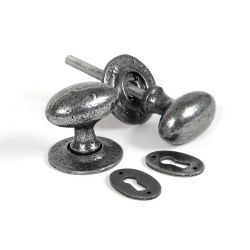 From the Anvil Pewter Patina Oval Mortice/Rim Knob Set